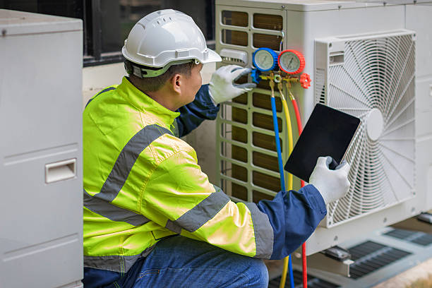 Professional Hvac technician working in Essex, MA